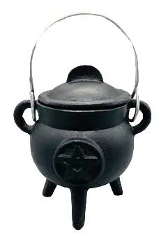 Black cauldron with a handle, used in Celtic spiritual practices and rituals.
