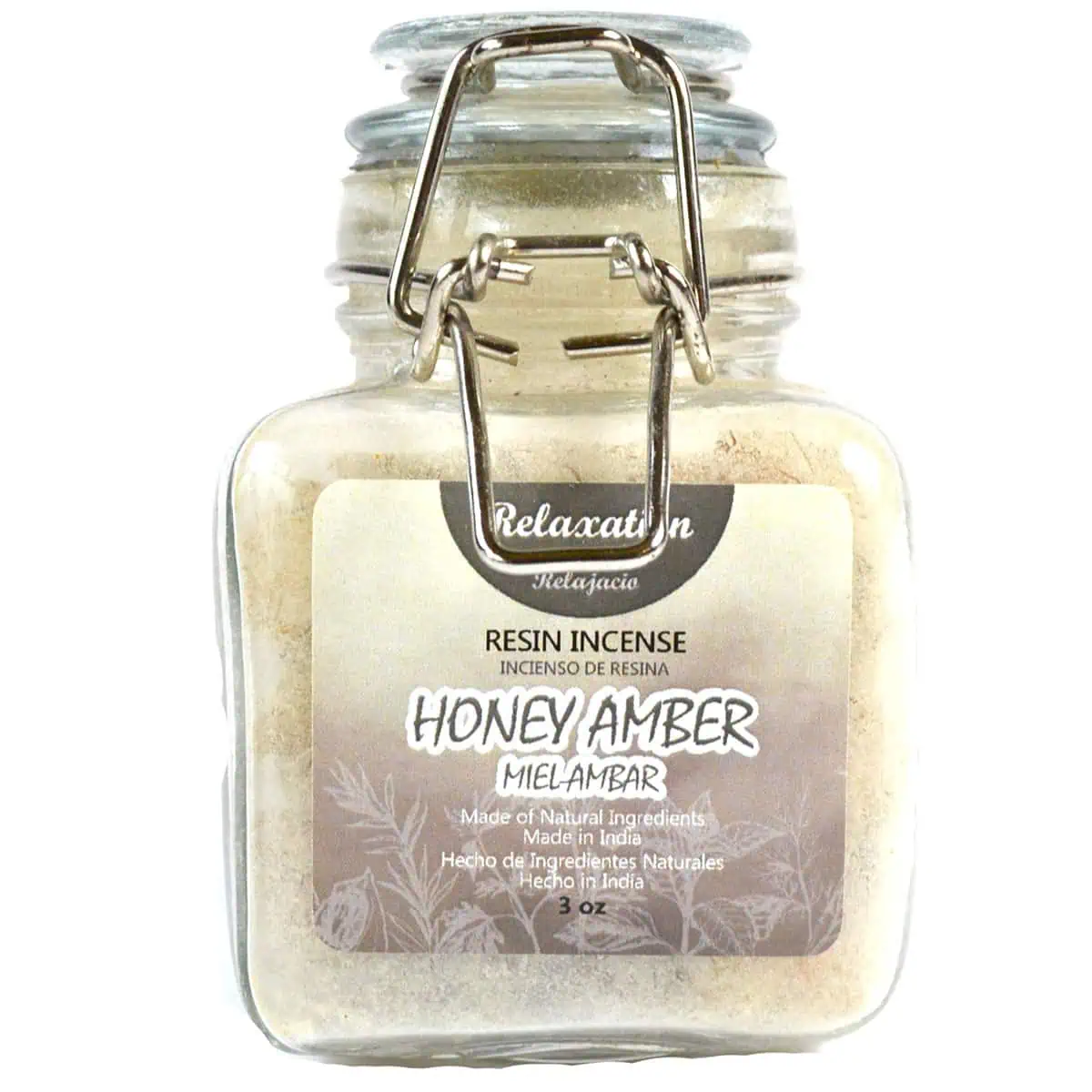 Resin incense jar labeled "Honey Amber" with a metal clasp and a beige label.
