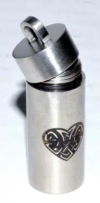 Metal lighter featuring a Celtic heart symbol, related to Celtic spirituality and symbolism.