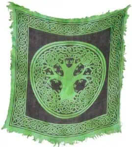 Celtic tree symbol on fabric, representing nature and spirituality.