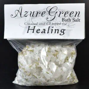 Bath salt with white crystals and gold-colored accents.