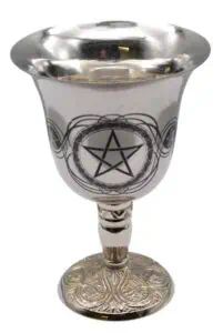 Silver chalice with pentagram and Celtic knot designs.