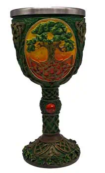 A Celtic-inspired goblet featuring a tree motif and intricate knotwork in green, yellow, and orange.