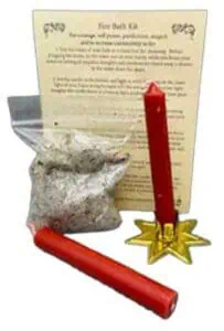 Fire back kit with red candle, star-shaped holder, and instruction sheet for Celtic spiritual practi.
