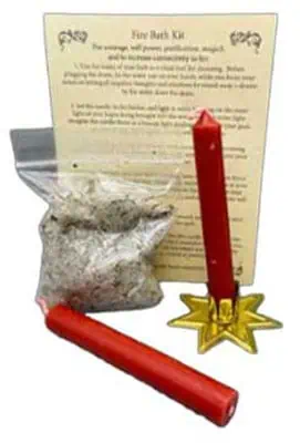 Fire back kit with red candle, star-shaped holder, and instruction sheet for Celtic spiritual practi.
