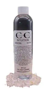 Bottle of Celtic-inspired water with spiritual symbols on label.