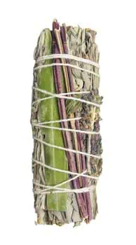 Herbal smudging bundle tied with string, used in Celtic spiritual practices.