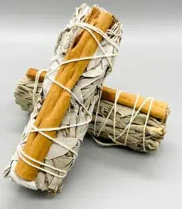 Two sage bundles tied with string, used in Celtic spiritual practices and rituals.