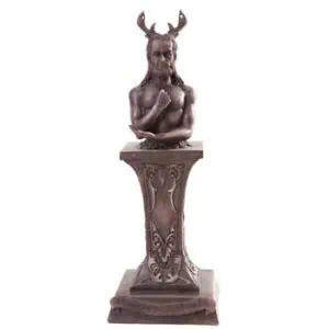 Cernunnos sculpture with antlers, displayed on an ornate pedestal, representing the Horned God in Celtic spirituality.